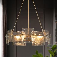 Designed to give a fresh appreciation of classic decor, the modern gold 6-light chandelier features a greatly proportioned art glass shade that encircles the vintage-style candelabra lighting sources. The polished brass elements have a modern purity, while the textured glass shade diffuses light in different ways according to the using spaces, showing high compatibility with heirloom decor. This contemporary glass drum chandelier is a balance of classic style and modern trend. Perfect choice for Gold Drum Chandelier, Modern Chandelier Dining, Living Room Light Fixtures, Drum Light, Glass Floats, Foyer Lighting, Contemporary Chandelier, Drum Chandelier, Gold Chandelier