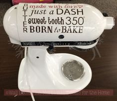 this is an image of a kitchen aid hand mixer with the words just a dash on it