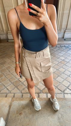 The pockets. The silhouette. The chic waist belt. The Kira Cargo Mini Skirt is too cute for words! Elevate it with a crisp button down, bodysuit, or pretty sweater and youre out the door! Seen styled with our White NikiBikki Bodysuit, Parker Cut Out Slides, and Bella Quilted Purse! 67% Cotton // 33% Nylon Structured fit Belted Front pocket Mini length Pretty Sweater, Cargo Mini Skirt, Childrens Shop, Pretty Sweaters, Quilted Purse, Quilted Purses, Beach Collection, Top Graphic Tees, Too Cute