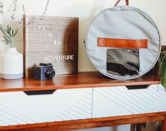 a bag sitting on top of a wooden table