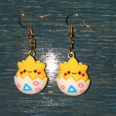 Super Cute Earrings Featuring Togepi In A Chibi Style. Handmade. Resin. Measures 1" X 1". Pricing Is Firm On Boutique Items. Thank You For Your Understanding. Handmade Kawaii Gold Jewelry, Handmade Gold Kawaii Jewelry, Adjustable Kawaii Dangle Earrings, Handmade Cute Plug Earrings For Gift, Cute Handmade Plug Earrings For Gift, Cute Adjustable Drop Earrings Jewelry, Playful Gold Hypoallergenic Earrings, Playful Hypoallergenic Gold Earrings, Kawaii Jewelry With Cute Adjustable Design