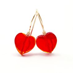 Delicate Heart Red Crystal Earrings, With Gold fill Wire. It's minimalist style make in detail unique. Beautiful Heart earrings in half embroidery make an excellent finish in these classic earrings. For these beautiful earrings you can choose to make us in any of our wrapped wire: rose gold, silver or gold the one you like best Receive these earrings in a box ready to give to make a detail to your IF YOU ARE INTERESTED IN BUYING THE CHAIN OF THIS NECKLACE, I LEAVE YOU THE LINK https://www.etsy.c Wire Rose, Black Heart Earrings, Raw Stone Earring, Red Heart Earrings, Crystal Heart Earrings, Simple Hoop Earrings, Blue Crystal Earrings, Mini Earrings, Big Hoop Earrings