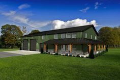 a large green house sitting on top of a lush green field