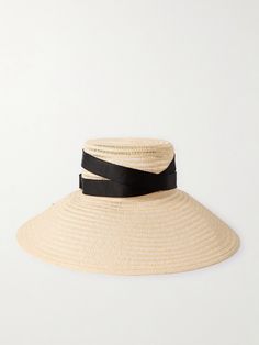 Eugenia Kim's 'Mirabel' sunhat is woven from straw in an airy, open construction and finished by hand in the designer's NYC studio. It's wrapped with black grosgrain ribbon around the crown and has an exaggerated brim that's perfect for shading your face during tropical vacations. Chic Cream Straw Hat, Chic Cloche Sun Hat For Vacation, Chic Cream Toquilla Straw Sun Hat, Elegant Woven Sun Hat In Toquilla Straw, Elegant Woven Sun Hat Made Of Toquilla Straw, Chic Beach Boater Hat With Cloche Shape, Beach Straw Hat With Short Brim In Sinamay, Sinamay Boater Hat With Curved Brim For Beach, Elegant Cream Woven Straw Hat