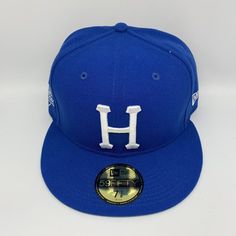 a baseball cap with the h on it