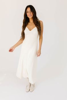 a timeless knit midi dress for every season, it features a flirty sweetheart neckline + a jaw-dropping fitted silhouette. whether you dress it up with heels for rooftop cocktail parties, or down with sneakers for semi-casual date nights, this creme white midi dress is a wardrobe staple. creme // midi length, sweetheart neckline, seam detailing model is 5'8" + wearing a small measurements are approximate + taken while laying flat small : bust 26” length 48” medium : bust 28” length 48” large : bu Casual Date Nights, Creme White, Semi Casual, White Midi, Cocktail Parties, Casual Date, Knit Midi, Nylon Fabric, Knit Midi Dress