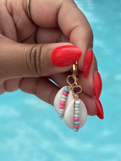 Beach-Themed Jewelry for Women Perfect to accessorize Cheap Summer Vacation Earrings, Handmade White Huggie Jewelry, White Handmade Huggie Jewelry, Shell-shaped Summer Beach Jewelry, Ocean-inspired Earrings For Beach Vacation, Ocean-inspired Shell Earrings For Beach, Shell-shaped Earrings For Beach Season, Handmade Shell-shaped Beachy Earrings, Themed Jewelry