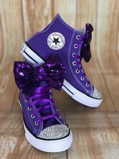 Purple Converse Touch of Bling Sneakers Little Kids Shoe Size 10-2 These authentic Purple Converse have a touch of bling on the toe, Converse emblem and back of the shoe. They are accessorized with a pink sequin bow. Information about the shoes All sneakers are Converse brand and have a mix of hand applied high quality glass crystals and resin flat-backs. Please select your color choice by the available drop down options, an option of all glass crystals no color is also available. Converse sizin Bedazzle Shoes, 2024 Purple, Ladybug Tutu, Bling Sneakers, Converse Collection, Dresses Halloween, Tenis Converse, Birthday Party Dresses, Diy Bling