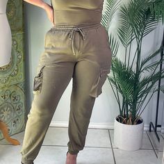 These Sweats Feature Adjustable Waist With Functional Drawstrings. Hugs Perfectly Around Your Ankle For That Up To Date Look In Sweat Pants. Functional Side Pockets. Pant: 100% Cotton Green Cargo Pocket Pants For Loungewear, Green Cargo Bottoms For Loungewear, Green Cargo Pants For Loungewear, Khaki Cargo Pants For Loungewear, Green Cargo Pants With Elastic Waistband For Loungewear, Khaki Lounge Pants With Pockets, Khaki Loungewear Pants With Pockets, Casual Green Cargo Pants For Loungewear, Spring Green Cargo Pants For Loungewear