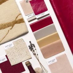 A mood board of Jamie Stern leather, fabric and rug samples inspired by Pantone's Color of the year 2023, Viva Magenta. Complimentary colors to Viva Magenta, including gray lilacs, beige and pastel pinks are also shown. 2023 Pantone, Viva Magenta, Color Of The Year, Pantone Color