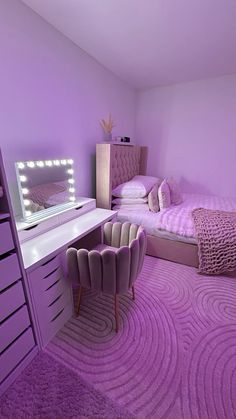 a bedroom with purple walls and carpeted flooring