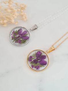 Vibrant purple real crocus necklace.  The pendant is round in either gold or silver plating.  The real flowers are preserved in resin.  The pendant measures 25mm in diameter. Necklaces will arrive in a bag ready for giving. Purple Birth Flower Necklace For Gift, Purple Flower Shaped Necklace With Pressed Flowers, Purple Flower Pendant With Pressed Flowers, Purple Flower Pendant Necklace With Birth Flower, Purple Flower Pendant Necklace For Birth Flower, Purple Birth Flower Pendant Jewelry, Purple Birth Flower Pendant Necklace, Purple Round Jewelry With Birth Flower, Purple Round Birth Flower Jewelry