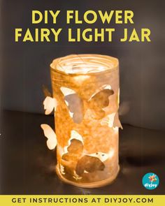 a book with the title diy flower fairy light jar written in yellow on it