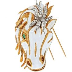 Capture the essence of elegance and boldness with the David Webb Platinum & 18K Yellow Gold White Enamel Diamond Horse Face Brooch. This stunning piece is a true masterpiece, exuding an air of sophistication and artistry. The intricate horse head design, adorned with captivating white enamel, is a testament to the brand's impeccable craftsmanship.The brooch features a mesmerizing emerald eye that adds a touch of allure to the piece. Surrounding the eye are 34 exquisite round diamonds, glistening Exquisite White Brooch For Formal Occasions, Luxury White Gold Brooches Collectible, Luxury White Gold Collectible Brooch, Luxury White Gold Collectible Brooches, Luxury White Hallmarked Brooch, Luxury Hallmarked White Brooches, Luxury White Brooch For Gift, Luxury White Brooches For Gifts, Luxury White Brooches As Gift