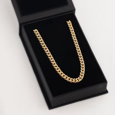 Make a statement with a gold Iced Cuban Link Chain. This chain is the perfect addition to any outfit and you can wear it every single day. Made for: Men (20 inch) & Women (18-20 inch) Thickness: 7mm Premium Gift Box: Included Classic Formal Jewelry With Chunky Chain, Formal Classic Jewelry With Chunky Chain, Classic Formal Chunky Chain Jewelry, Formal Classic Chunky Chain Jewelry, Classic Cuban Link Necklace, Tarnish Resistant, Classic Gold Plated Chain Necklace, Formal Yellow Gold Necklace With Chunky Chain, Formal Yellow Gold Chunky Chain Necklace, Classic Cuban Link Necklace With Chunky Chain