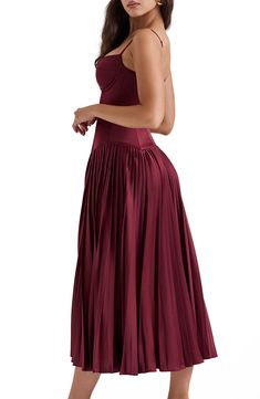 Fall for the sultry silhouette of this rich satin maxi designed with a corseted bodice and a swingy pleated skirt. Back zip closure Sweetheart neck Adjustable straps Lined 94% polyamide, 6% polyurethane with 95% polyester, 5% elastane contrast Dry clean Imported Fitted Satin Pleated Maxi Dress, Strapless Pleated Party Dress, Pleated Fitted Satin Maxi Dress, Satin Maxi Dress With Pleated Bodice For Night Out, Accordion Pleated Full Skirt Party Dress, Long Pleated Party Dress, Pleated Long Party Dress, Full Skirt Dress With Accordion Pleats For Party, Pleated Long Dress For Party