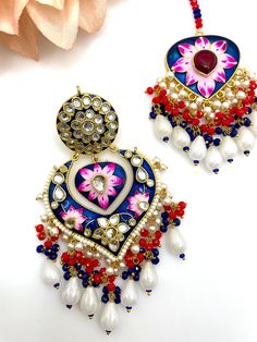 This is a beautiful maangtika set with matching big jhumkas. The work in in meenakari with high quality stones and comes in fun summer pastel colors to wear to any wedding or event! The pearl hangings complete the look for a statement. Grab a color to accentuate any outfit! Affordable Meenakari Danglers For Festivals, Festive Meenakari Jewelry, Indian Head, Authentic Indian, The Pearl, Fun Summer, A Color, Bridal Earrings, Indian Jewelry