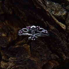 Featuring intricate skull details, this Gothic Mens Wedding Ring is the perfect choice for those seeking a fantasy-themed and vintage-inspired aesthetic. The unique design makes it an exceptional piece for gothic forest jewelry enthusiasts. Characteristics: Metal - Recycled solid sterling silver  Stone - Cubic Zirconia Finish - Oxidized. View all silver gothic rings: https://www.etsy.com/shop/TinyShinyJewel?ref=seller-platform-mcnav&section_id=42765371 Care instructions: To care for the ring, avoid contact with water and chemicals such as perfumes and lotions. When the ring is not in use, store it in a dry, cool place to prevent tarnishing. Additional information:  ✦ All rings are made to order. An average turnaround time is 1-5 days. I will make every effort to ship the ring sooner. ✦ FRE Gothic Skull Wedding Rings, Gothic Sterling Silver Wedding Rings, Silver Spiritual Skull Ring For Anniversary, Silver Gothic Skull Ring For Anniversary, Sterling Silver Skull Ring For Wedding, Mystical Silver Rings For Weddings, Mystical Silver Rings For Wedding, White Gold Sterling Silver Skull Ring For Wedding, Gothic Forest