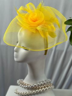 Step into style with our enchanting yellow Fascinator Hat, the ultimate statement piece for any sophisticated soiree. Crafted with the utmost care, this hat exudes elegance and is guaranteed to turn heads at any event. The vibrant yellow hue symbolizes warmth, joy, and positivity, making it a perfect companion for Derby days, church services, weddings, and even royal tea parties. The whimsical floral design adds a touch of grace and femininity, while the lightweight mesh ensures it's as comforta Yellow Fascinator, Royal Tea Parties, Royal Tea, Chic Vibes, Fascinator Hat, Derby Day, Derby Hat, Tea Parties, Fascinator Hats