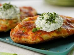 baked potato wedges topped with cream cheese and herbs