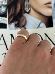 Elevate your style with this exquisite round three-stone diamond pinky ring. Featuring three brilliantly cut diamonds, this elegant piece adds a touch of timeless sophistication to any look. Available in 14k Yellow Gold, White Gold or Rose Gold Total carat weight: 0.25 ct Diamond Color: G / Diamond Clarity: SI1 Tapered Band: 5.5mm (Top), 2.5mm (Bottom) Made to order. Lead time is 4-6 weeks. Benefits of Solid 14k Gold Jewelry Most loved for its durability and longevity Can be worn daily and requi Diamond Pinky Ring, Gold Pinky Ring, Trinity Ring, Three Stone Diamond, Pinky Ring, Diamond Color, Three Stone, Diamond Clarity, Lead Time