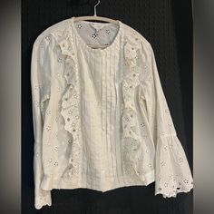 New With Tags J. Crew Women’s Size 12 Floral Eyelid Embroidered Cream Blouse With Ruffle Details And Bell Sleeves Length 23.5” Bust 20.5” Let Me Know If You Have Any Questions! Will Ship Promptly With Love And Care. Cream Collared Embroidered Top, Cream Embroidered Collared Top, Cream Long Sleeve Folk Blouse, Bohemian Cream Blouse With 3/4 Sleeves, Blouse With Bell Sleeves, Ruffle Top Blouses, J Crew Women, Bohemian Off-white Blouse With Lace Trim, Cream Blouse