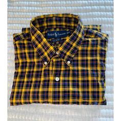 Nwt Ralph Lauren Plaid Long Sleeve Shirt With Blue Pony Yellow/Black/Blue/Red Plaid Design Size Is Xl Ptp 25” Length 32” Will Ship Same Day For Your Convenience Fitted Ralph Lauren Shirt For Fall, Ralph Lauren Plaid Button-up Top, Ralph Lauren Button-up Shirt With Button Closure, Ralph Lauren Plaid Collared Shirt, Casual Ralph Lauren Collared Shirt, Ralph Lauren Casual Fall Shirt, Ralph Lauren Preppy Button-up Shirt, Ralph Lauren Plaid Button-up Shirt, Preppy Ralph Lauren Button-up Shirt