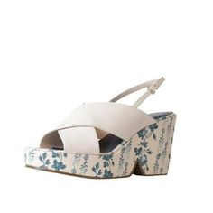 The SOLITAIRE is the perfect wedge to transition to warmer weather. Its open toe and heel make it easy to slip on and comfortable to wear. Size: 11.  Color: Blue.  Gender: female.  Age Group: adult.  Pattern: floral. Spring Light Blue Platform Sandals, Blue Wedge Sandals With Buckle Closure, Denim Blue Platform Sandals, Blue Floral Print Open Toe Heels, Blue Open Toe Platform Wedge Sandals, Fashion Sandals, Blue Sandals, Open Toe, Ankle Strap