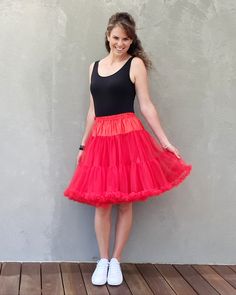 FREE SHIPPING ON ORDERS OVER $100Due to high demand please allow 3-4 weeks for shipping! This gorgeous petticoat is so soft, comfortable and adds amazing volume to any gig outfit, costume or rock and roll dress. Pair this with any of our dresses to elevate your outfit to the next level and give you that WOW factor you deserve. Features 3 layer petticoat with 2 super soft high volume tulle layers with ruffled edges and 1 silky inner layer for comfort. Elastic waistband to fit a variety of sizes: