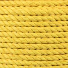 yellow twisted rope on white background