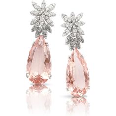 Indulge in the luxurious beauty of these 18k white gold Ghirlanda Atelier Earrings by Pasquale Bruni. The exquisite design features a stunning morganite stone that shimmers with a subtle pink hue, surrounded by brilliant white and grey diamonds. The unique color combination of these gems creates a mesmerizing contrast that will captivate any onlooker. The earrings are masterfully crafted with intricate details, making them an exceptional addition to any fine jewelry collection. These earrings wi Luxury Fusion Jewelry With Natural Stones, Luxury Elegant Gemstone Earrings, Luxury Silver Jewelry With Stone Work, Luxury Pear-shaped Earrings For Formal Events, Luxury Pear-shaped Earrings For Formal Occasions, Elegant Platinum Bridal Earrings, Luxury Pear-shaped Gemstone Diamond Earrings, Luxury Pear-shaped Diamond Earrings With Gemstones, Formal Briolette Diamond Cut Earrings