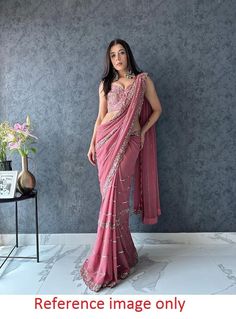 Georgette saree with blouse, Pink saree for women, wedding saree for function, sequence saree for evening wear, designer saree for function Saree Details:  Saree Color: Pink  Saree Fabric:  Faux Georgette Saree Work: Fancy  Thread Work  With  Sequence Work Saree Length:5.5 Meter Blouse Details : (UN-Stitched) Blouse Color: Matching. Blouse Length: 0.8meter Blouse Fabric:  Heavy Mono banglory Blouse Work:All Over Thread With  Sequence Work Blouse wear by model is just for modeling purpose only, a Anarkali Style Pre-draped Saree With Unstitched Blouse, Semi-stitched Party Wear Saree For Wedding, Diwali Party Wear Georgette Pre-draped Saree, Party Wear Pre-draped Saree With Unstitched Blouse, Evening Saree Blouse Piece With Resham Embroidery, Evening Blouse With Resham Embroidery, Evening Blouse Piece With Resham Embroidery For Saree, Wedding Party Wear Pre-draped Saree For Diwali, Fitted Pre-draped Saree With Cutdana