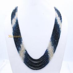 Genuine Blue Sapphire Beaded Necklace-7 Strand Sapphire Necklace-Sapphire Beads Necklace-Gemstone Beads Necklace-Rondelle Sapphire Necklace Gemstone Details: ✦ Gemstone : Blue Sapphire  ✦ Gemstone Shape : Rondelle  ✦ Strand  : 7 ✦ Necklace Length : 21  Inch  ✦ Total Weight : 5151 CT  CUSTOMISATION DETAILS : We can customize any piece of fine jewelry. You can simply message us on Etsy or drop a text at +91-7357229656 (WhatsApp/iMessage) to let us know about all the customization you want. Customi Blue Gemstone Rondelle Beaded Necklace, Blue Gemstone Beaded Rondelle Necklace, Blue Round Gemstone Beads, Sapphire Beaded Necklaces With Faceted Round Beads, Blue Gemstone Beaded Necklaces, Blue Round Faceted Beaded Necklaces, Blue Beaded Necklaces With Faceted Round Beads, Blue Faceted Beaded Necklace, Necklace Sapphire