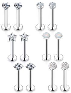 six pairs of surgical piercings with crystal stones