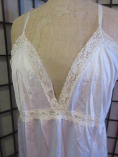 Here is a great woman's slip from the 1950's/60's by Deanna. It is a nylon knit with insert lace on the band and trimming the neckline and hem.. The straps are adjustable and it has a square cut back. The size is a 38, the cups measure 48 so probably a d size.  The length from center front is 30 inches. It is in great condition.  Great as lingerie or nightwear. What goes around, comes around Love of beauty and quality is happiness Shipping is standard mail which is not so slow in North America b Great Women, Square Cut, Nightwear, Lace Trim, North America, Knee Length, Two By Two, Slip On, Mid Century