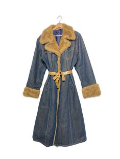 2000s denim trench coat, vintage padded long jeans jacket with faux fur details Fit size: M circa: 2000s color: blue fabric: denim, faux fur condition: very good vintage condition on model size S/M height 165 cm measurements: shoulder: 47.5 cm pit to pit: 56 cm waist: 51 cm sleeves: 60.5 cm back length: 122 cm Follow us on Instagram for the latest  @lividomilano www.instagram.com/lividomilano questions about this product? this item is clean and comes from a pet & smoke free building. every vinta Winter Denim Long Coat, Trench Coat Vintage, 2000s Denim, Long Fur Coat, Long Denim Jacket, Denim Trench Coat, Long Coat Women, Coat Vintage, Jeans Jacket