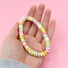 Classic Rainbow Details: High quality pastel acrylic beads in a rainbow of soft pastel shades Really looks like candy! (but hey..don't eat it) a cheery versatile piece to add to your everyday jewelry rotation Stretchy Handmade Measurements: Choose your length for a perfect fit! 7.5" is a standard adult wrist Get 2 and match with your BFF! Remember those awesome candy necklaces you had as a kid? They came on stretchy string and were fun to wear and to eat. I made these bracelets inspired by those Candy Bracelet, Candy Necklaces, Pastel Shades, House Gifts, Ring Pendant Necklace, Tea Collection, Matching Necklaces, Everyday Jewelry, Acrylic Beads