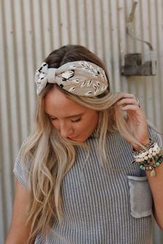 Oh-so-cute, the Monochrome Bloom Garden Headband is super stylish and cozy. It's perfect for keeping your tresses up and away, giving you a totally chic look! Comfortable, soft, and cozy fabric with so pretty floral design Wide band with slip-on style silhouette So pretty knot detailing for added boho style Pair with: Eye Of The Sun Padded Bralette, Lets Jet Set Wide Leg Pants and Wishing Star Necklace. *Due to lighting and differences in monitors, actual colors may vary slightly from what appea Wishing Star, Boho Essentials, Bralette Outfit, Padded Bralette, Moon Collection, Cozy Fabric, Wide Bands, New Tops, Hair Accessories Headbands