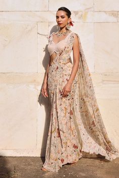 Blush pink pre-draped saree with floral print all over. Paired with a glass bead and mirror embellished floral cutwork padded blouse. - Aza Fashions Elegant Floral Print Floor-length Saree, Elegant Floor-length Floral Print Saree, Elegant Floral Print Choli With Traditional Drape, Elegant Floral Print Traditional Choli, Elegant Fitted Floral Print Saree, Elegant Floral Print Pre-draped Saree For Reception, Elegant Floral Pre-draped Saree For Reception, Elegant Summer Pre-draped Saree With Dupatta, Elegant Floor-length Floral Print Choli