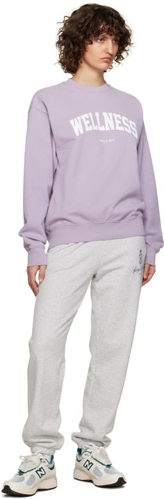 Pre-shrunk cotton fleece sweatshirt. · Rib knit crewneck, hem, and cuffs · Text and logo printed at front Supplier color: Faded lilac/White Rich Clothes, Lilac White, Rich Purple, Sporty And Rich, Knit Crewneck, Fleece Sweatshirt, Cotton Fleece, Luxury Streetwear, Rib Knit