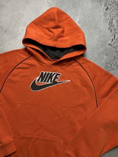 Hoodie Nike Vintage center logo swoosh hype fit Travis Style Size Men's / US M / EU 48-50 / 2 Color Orange Condition Gently Used Nike Vintage central logo central swoosh crewneck 80s 90s 00s retro spellout y2k sweatshirt centre swoosh big logo.   The material is pleasant to the body. In a good condition. Fast sending! Tag size XL, but fits size M. (See measurements) Condition : 9/10 Chest - 54 cm Length - 63 cm Sleeve length from neck - 71 cm Sleeve length from armpit - 49 cm - ALL ITEMS ARE HEA Sporty Logo Hoodie Top, Logo Hooded Top For Streetwear, Hooded Logo Top For Streetwear, Sporty Fleece Hoodie With Logo Print, Athleisure Hoodie Sweatshirt With Logo Detail, Winter Athleisure Hoodie With Logo Detail, Winter Athleisure Hoodie With Logo, Sportswear Fleece Hoodie With Logo Print, Logo Cotton Hoodie In Athleisure Style