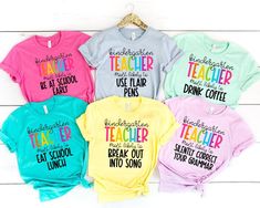 Back To School Shirt, Kindergarten Teacher Shirt, Most Likely To Teacher Tees, Colorful Teacher TShirt, Cute Kindergarten Team Teacher Shirt ❤️ Product Details:    solid color unisex tees are super soft ring-spun cotton  heather tees are a soft cotton-poly blend  light fabric (4.2 oz/yd²)  loved by all name brand Bella+Canvas   runs true to size in a loose fit  excellent quality print ❤️ HOW TO ORDER T-SHIRT 1-) Please, Check and Review all Photos. 2-) Select Your T-shirt Size. 3-) Click ADD TO Relaxed Fit Multicolor Pre-shrunk Shirt, Colorful Letter Print Top For Summer, Colorful Crew Neck Top With Letter Print, Yellow Letter Print Top For School, Fun Multicolor Tops For School, Multicolor Crew Neck Tops For School, Trendy Multicolor School Shirt, Colorful Fun Cotton T-shirt, Multicolor Screen Print Shirt With Relaxed Fit