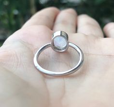 "A stackable sterling silver ring featuring a faceted oval-shaped Rainbow Moonstone set in a simple bezel setting, which makes a great birthstone ring for those June Birthdays. Wrapped in a box ready for gift giving.(r-new-29) Rainbow Moonstone measure 8mm x 6mm *Follow us @belesasjewelry on Instagram for promotions/giveaways *LIKE* us on Facebook http://www.facebook.com/Belesas to find special coupon codes *If you like the ring, please click on the \"Pin It\" icon ------------------------------ Stackable Rings With Moonstone Gemstones, Oval Moonstone Gemstone Stackable Rings, Oval Moonstone Stackable Rings With Gemstone, Oval Opal Stackable Rings, Oval Faceted Crystal Promise Ring, Everyday Oval Moonstone Ring, Moonstone Stackable Rings For Gift, Oval Stackable Moonstone Ring Gift, Oval Moonstone Stackable Rings As Gift