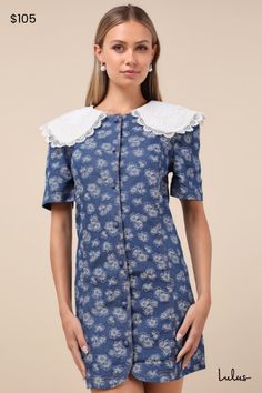 Romantic, endless summer vibes are here, thanks to the Sister Jane Wildflower Blue Floral Jacquard Denim Lace Collar Mini Dress! Stretchy woven denim boasts a playful floral jacquard design as it shapes this sweet dress that has a whimsical, Peter-pan style collar with applique satin cording and vintage-inspired lace trim. Short sleeves frame a shift-style bodice that has a functional front button placket and continues down to a mini hem. Fit: This garment fits true to size. Length: Mid-thigh. B Denim Blue Floral Embroidery Dress, Spring Dresses With Embroidered Peter Pan Collar, Cute Blue Dress With Peter Pan Collar, Vintage Dress With Peter Pan Collar And Floral Print, Vintage Floral Print Dress With Peter Pan Collar, Collar Mini Dress, Sister Jane, Beach Wedding Guest Dress, Sisters Dress