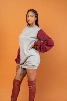 We know you like to stay stylish and comfy...our GABRIELLE sweater dress feels like pajamas but looks incredibly chic. Ready to dress up with an over-the-knee boot or dress down with sneakers. Featuring long ruched sleeves, 2 colour-block hues in burgundy/grey, and tie-up detail on the bottom hem. Materials: 64% Rayon, 32% Polyester, 4% Spandex French Terry Brush Fabric Product Origin: USA Model size: Model is 5’8, wearing size S Care Instructions: Hand Wash/Hang Dry or Dry Clean Long Sleeve Winter Dress With Ribbed Cuffs, Winter Long Sleeve Dress With Ribbed Cuffs, Color Block Mini Dress For Fall, Casual Sweater Dress With Ribbed Cuffs For Spring, Casual Spring Sweater Dress With Ribbed Cuffs, Fall Color Block Mini Dress, Long Sleeve Dresses With Drawstring For Fall, Long Sleeve Drawstring Dresses For Fall, Winter Mini Sweater Dress For Loungewear