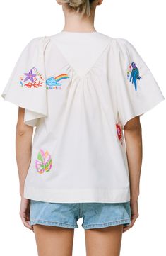 Colorful embroidery adds a vacation-ready twist to a woven cotton shirt in a relaxed silhouette. 24" length Button half placket Jewel neck Short sleeves 100% cotton Hand wash, dry flat Imported Asian & Pacific Islander Owned/Founded Embroidered Camp Shirt With Relaxed Fit For Vacation, Embroidered Camp Collar Shirt For Vacation, Spring Vacation Embroidered Camp Shirt, Embroidered Camp Shirt With Camp Collar For Vacation, Embroidered Vacation Tops With Camp Collar, Casual Embroidered Top With Camp Collar, Beach Embroidered Shirt With Camp Collar, Embroidered Camp Collar Top For Beach, Summer Embroidered Relaxed Fit Shirt