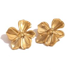 Add a pop of fun to your spring wardrobe with these Flower Statement Earrings! These large flower earrings are the perfect accessory to make a statement with your outfit. Embrace the spirit of the season with these playful and quirky earrings. DETAILS & SIZE Sold as a pair Finish: 18K gold plate Material: Stainless Steel Measurements: Large: 29mmx33mm; Medium: 19mmx16mmmm Weight: Large: 10.8 grams; Medium: 3.5 grams Comes with friction earring backs Waterproof, tarnish-resistant, and nickel free Shop Earrings to curate your ear stack! Trendy Flower-shaped Earrings For Party, Trendy 3d Flower Earrings For Spring, Chic Flower Charm Drop Earrings, Chic Drop Earrings With Flower Charm, Flower-shaped Earrings For Spring Party, Chic Spring Flower Earrings For Pierced Ears, Spring Party Earrings With 3d Flowers, Spring Party Flower Earrings With 3d Flowers, Spring Party 3d Flower Earrings