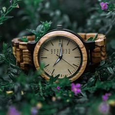 This wood watch is made out of two-toned zebrano wood, and has a date and week display. This men's watch can be custom engraved, making it a personalized and original gift. Because wood is a natural material, it is super comfortable and lightweight to wear. All of our wood watches are unique and one of a kind. Our wooden watches can be personalized by having the back case engraved. Our watches come in a luxury wooden giftbox and are a great gift for men. 🤗 FREE ENGRAVING 🤗 It is possible to pe Outdoor Watches With Date Display, Round Dial, Stainless Steel Chronograph Watch As Gift, Stainless Steel Chronograph Watch Gift, Stainless Steel Chronograph Watch With Round Dial For Gifts, Timeless Watch Accessories With Date Display As Gift, Analog Watches As Gifts, Personalized Watches With Round Dial For Gifts, Personalized Watches For Gifts, Personalized Watches As Gifts