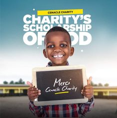 a young boy holding up a chalkboard that says charity's school ship offd