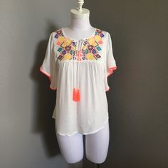 Embroidered Blouse White Embroidered Short Sleeve Top, White Short Sleeve Embroidered Spring Top, White Short Sleeve Embroidered Top For Spring, White Embroidered Short Sleeve Top For Spring, White Embroidered Top With Short Sleeves For Spring, Casual White Blouse With Floral Embroidery, White Casual Top With Floral Embroidery, White Floral Embroidery Beach Blouse, White Floral Embroidered Beach Blouse